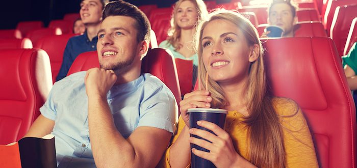 man-woman-watch-movie-theater